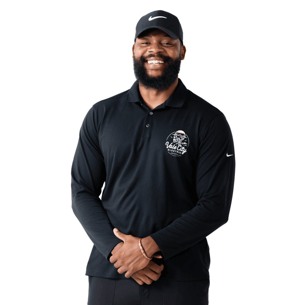 John Crowder of Vale City Electric wearing company-branded polo in Phoenix Arizona, representing Black-owned electrical business
