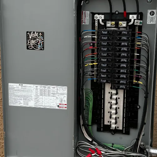 100 amp sub-panel installed by Vale City Electric in Buckeye Arizona with clean labeled wiring and branded stickers, part of 400 amp main panel upgrade